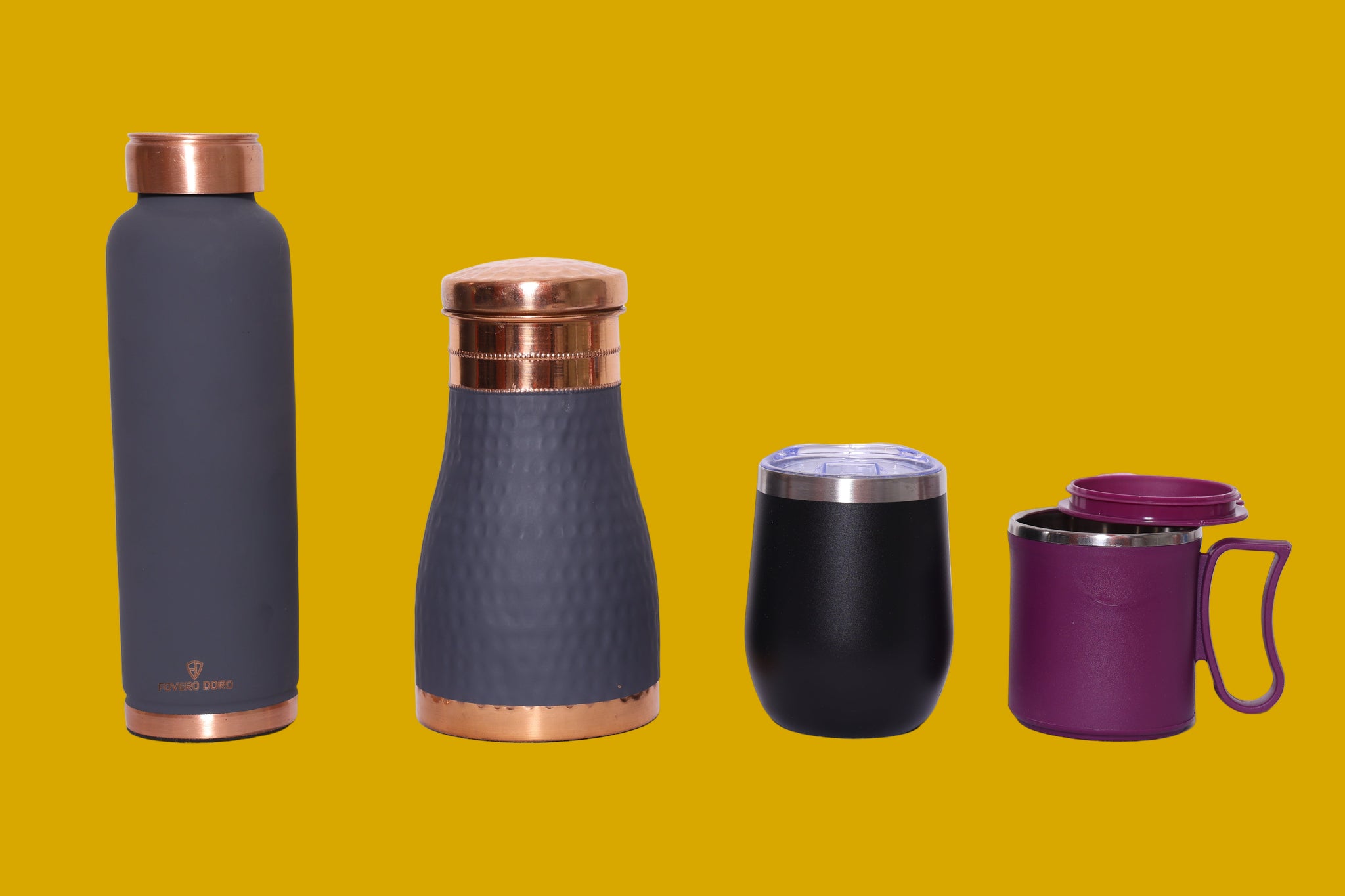Set of insulated copper jars and cups with metallic tops on a mustard background