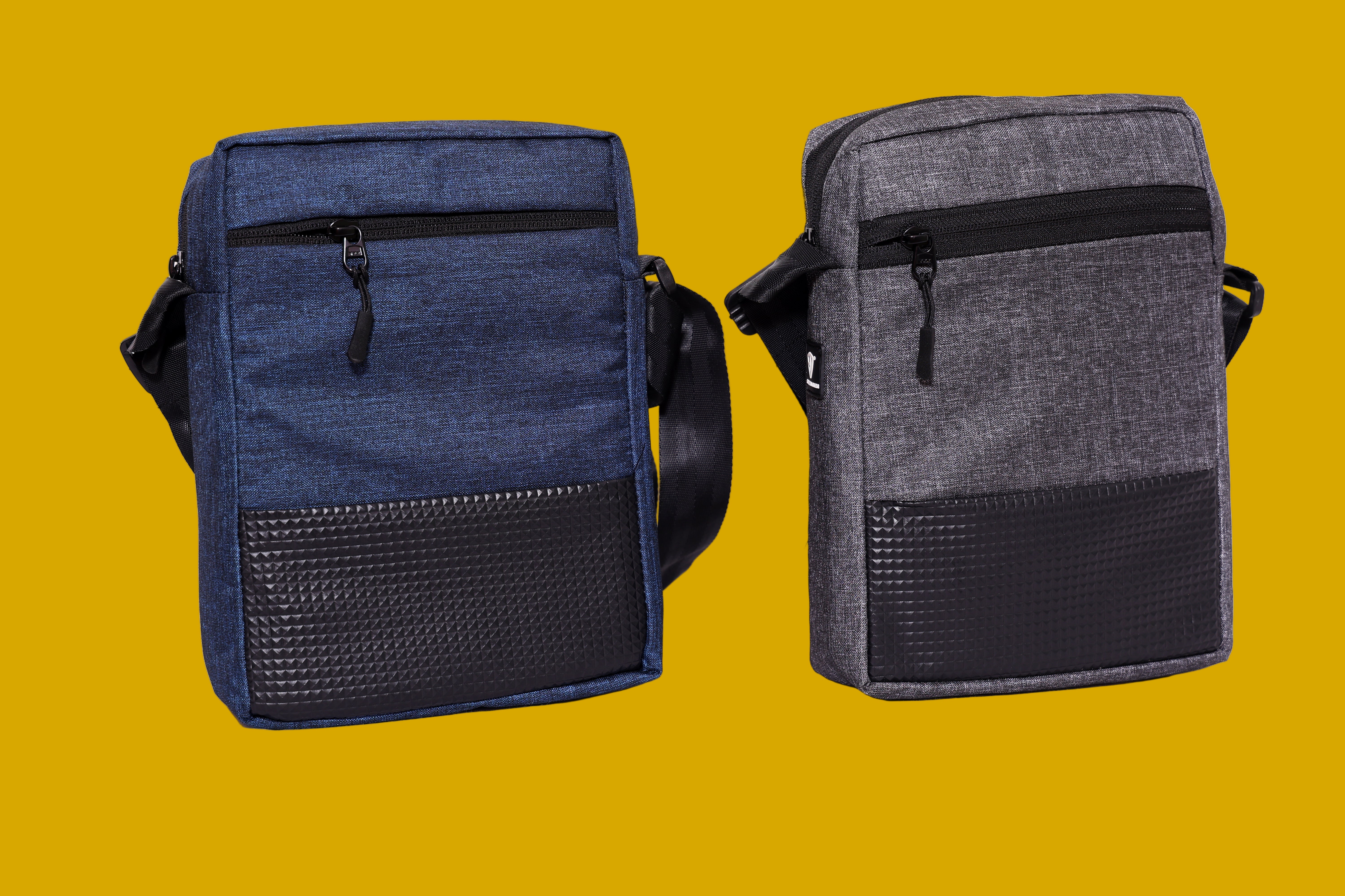 Two Khadi/Jute, canvas shoulder bags, one blue and one gray, on a mustard background