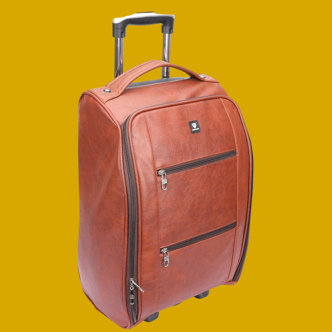 Vegan Executive Cabin Luggage with a handle and wheels on a mustard background