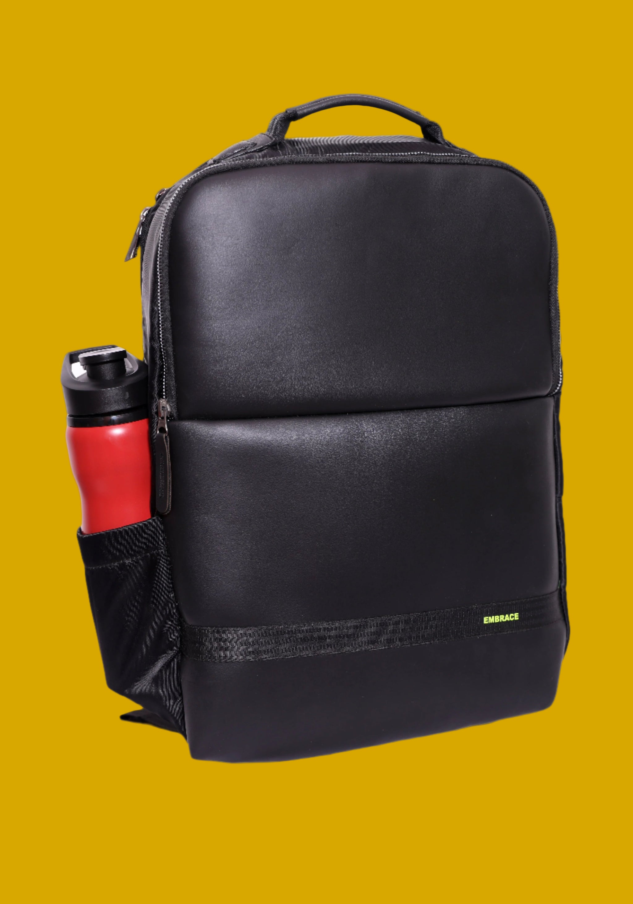 Black Vegan Leatherette Bag pack with a red and black flask bottle