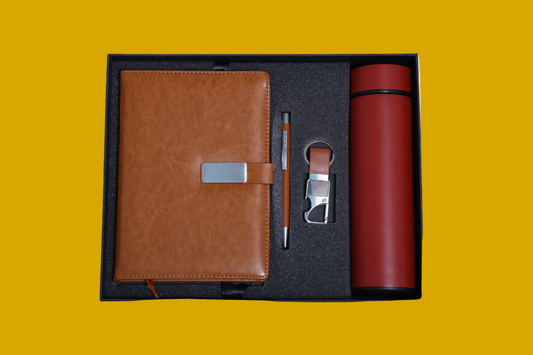 Corporate Gift set with brown leatherette notebook, red thermos, pen, and bottle opener in a black box.